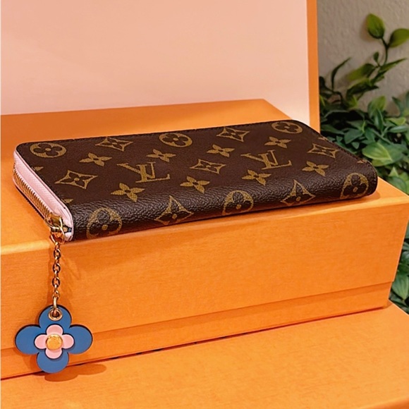 Louis Vuitton Handbags - 💯% AUTHENTIC LOUIS VUITTON
MONOGRAM CANVAS FLOWER CLEMENCE WALLET✨